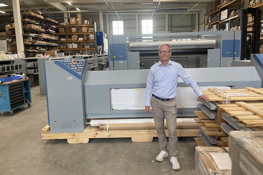 Pic: iNTERSPARE Textilmaschinen Managing Director Dirk Polchow looks at the components of the Krantz K30 stenter frames set up for delivery to a major Indian customer © 2025 iNTERSPARE