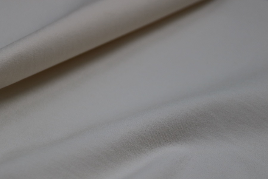Apparel fabric spunfit:Cotton and Polyester and PA SPA covered yarn © 2026 KARL MAYER