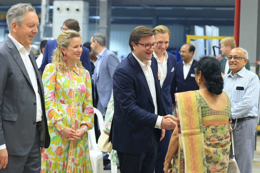 Heinrich Trützschler, Shareholder, Charlotte Fontaine, Shareholder and member of the Supervisory Board and Florian Schürenkrämer, Shareholder and member of the Supervisory Board, welcome guests to the new manufacturing plant in Sanand © 2025 Trützschler