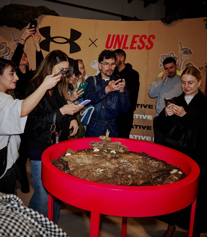 Demonstrating the biodegradable fabric © 2025 Under Armour